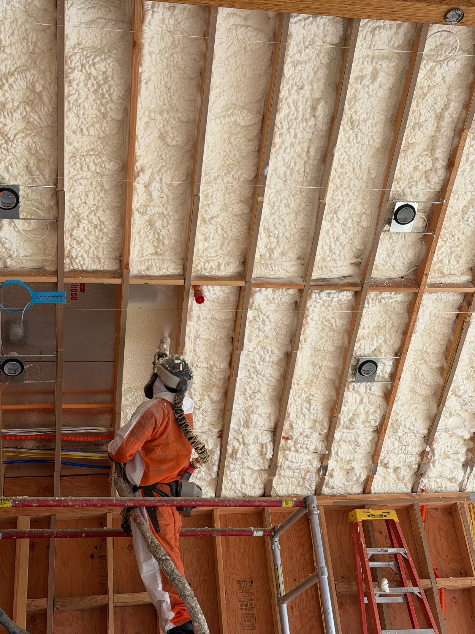 AtticPro insulation installation in progress