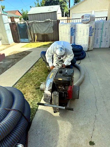 AtticPro crew installing blown in insulation